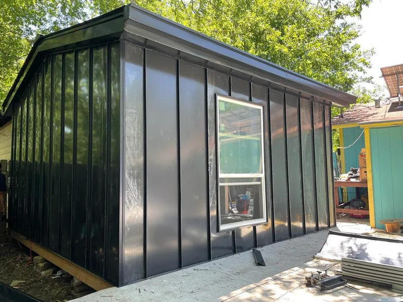 Black standing seam metal wall panels for Metal Roof Installation in Sutton